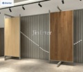 Sliding metal display racks for ceramic tiles, stone, quartz, wood flooring, and PVC panels, designed for tile showrooms