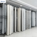 Custom-made display racks for floor-to-ceiling curtains in retail stores, fabric sample display racks, and fabric storage racks